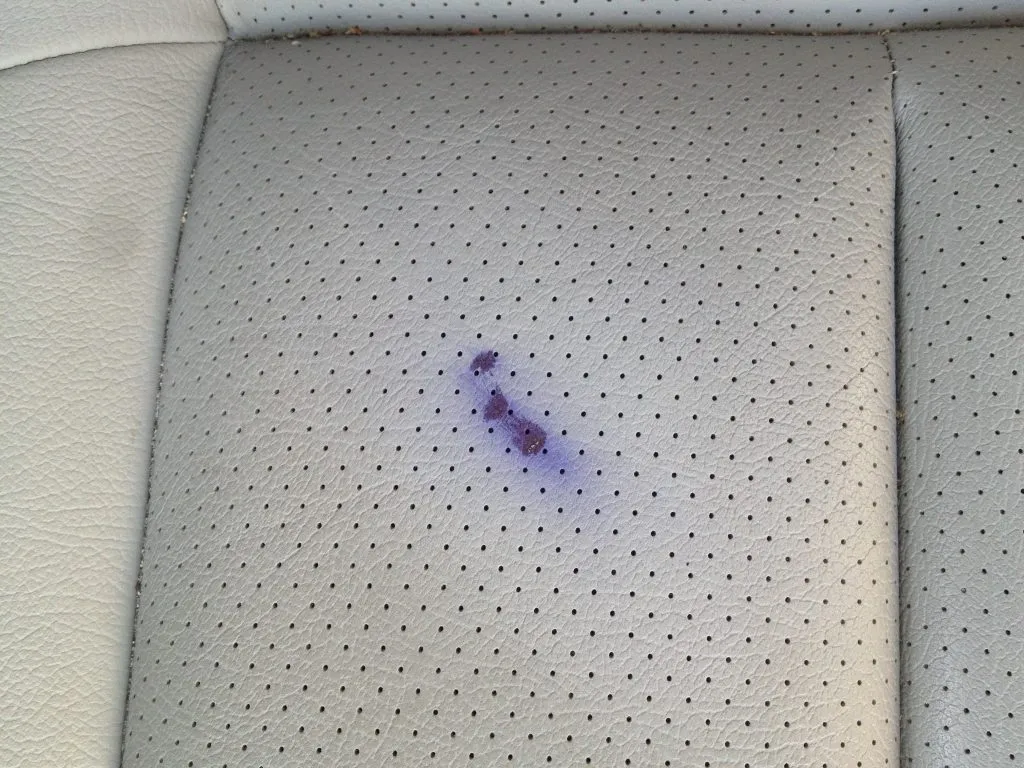 How to remove ink stains from leather car seats?