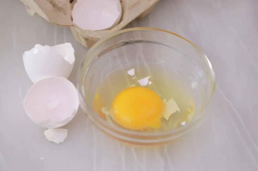 How to Easily Remove Eggshell Pieces From Yolk