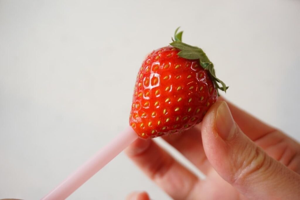 Remove the Stem of a Strawberry With a Straw
