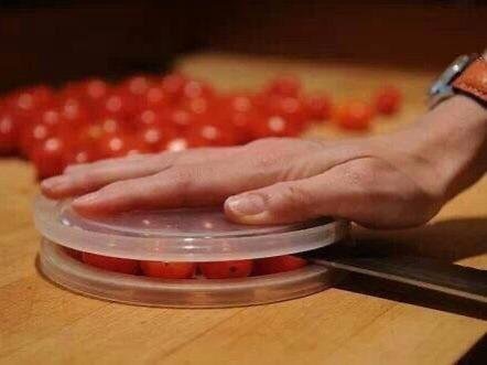 Slice Multiple Cherry Tomatoes at Once With Two Plates